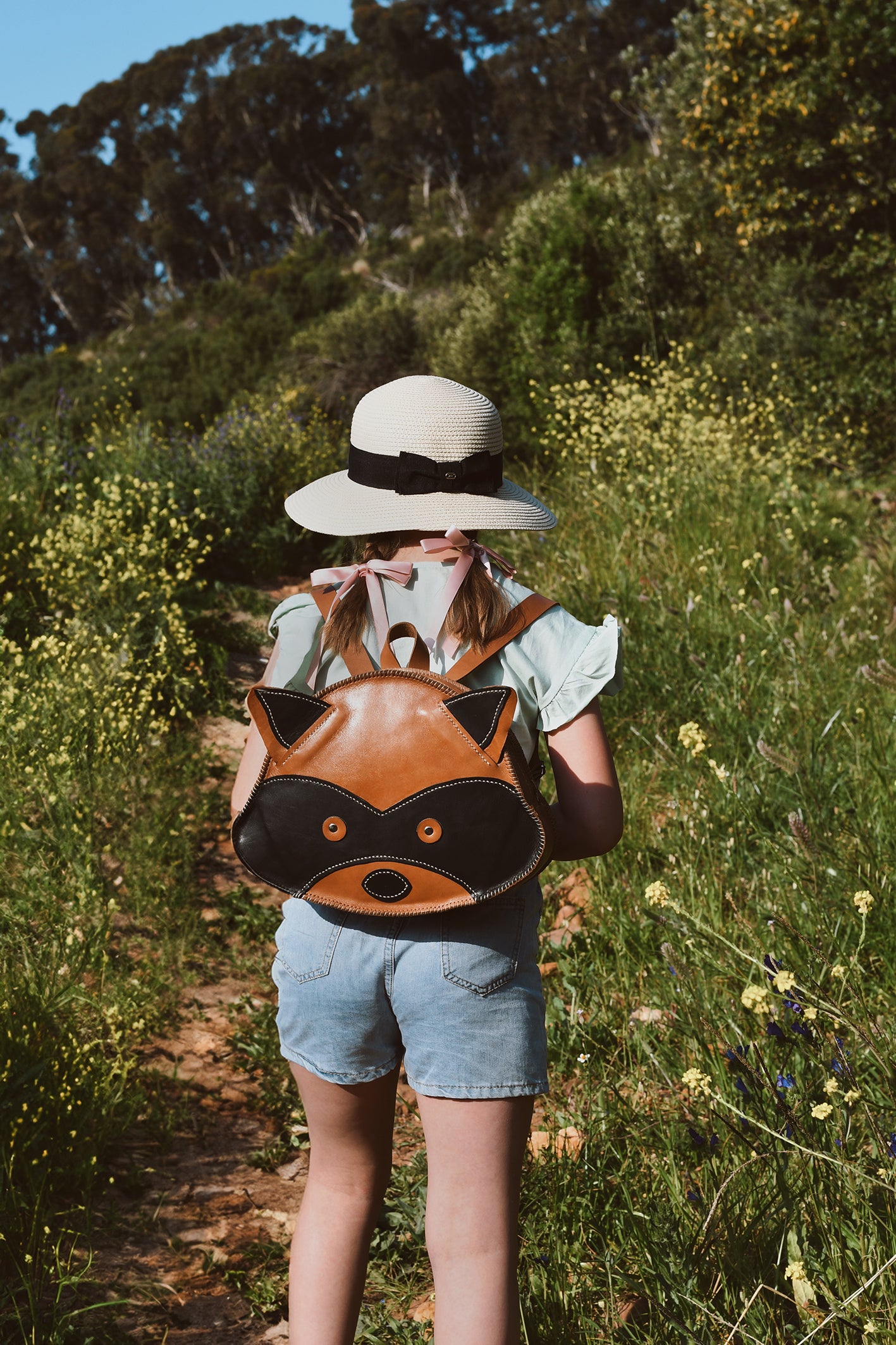 Beautiful handcrafted brown leather bag for kids of a raccoon made in Cape Town, South Africa, R1,380